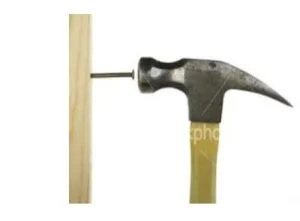 Integrated Science: Hammer and the nail related in term of pressure